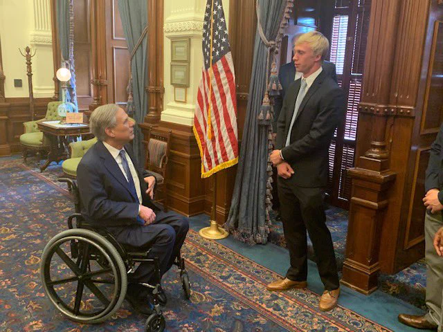 Governor Abbott and Bearkat football player.
