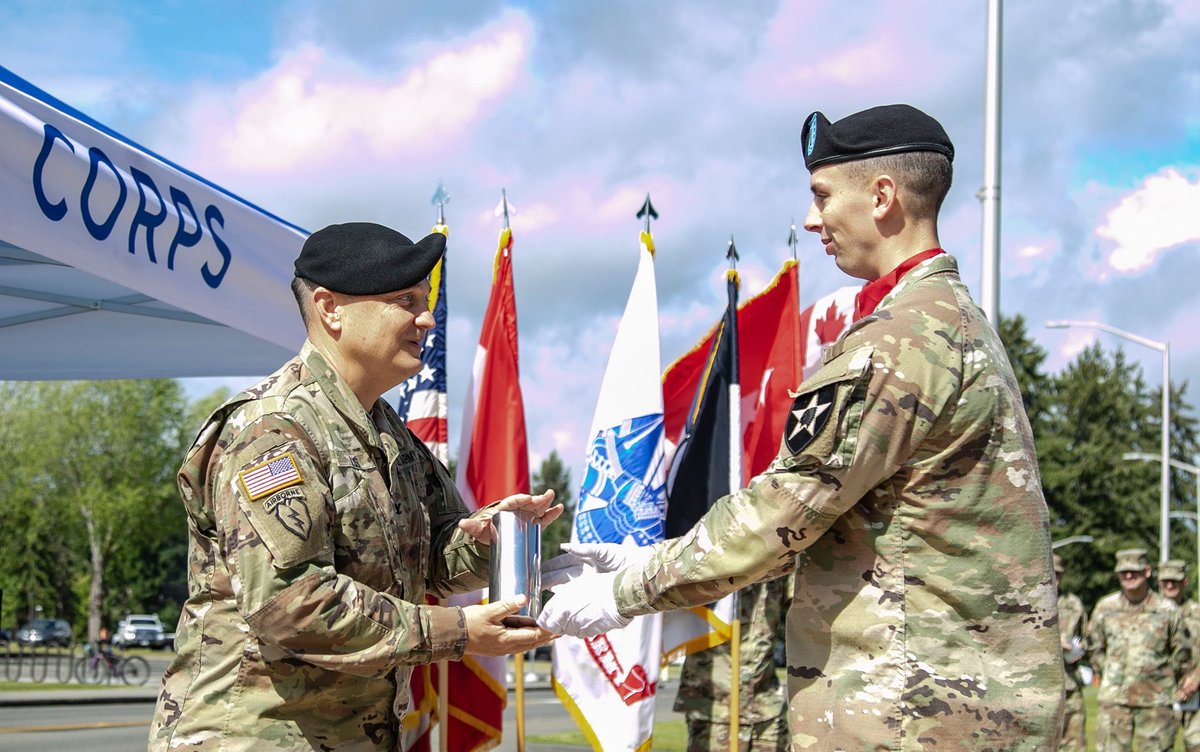I_Corps's tweet photo. Lt. Gen. Randy A. George hosted a “Courage Honor Ceremony” to bid farewell to the Corps’ Deputy Commanding General for Operations, Canadian Brig. Gen. Stéphane R. Boivin and to welcome Col. Patrick J. Ellis, the Corps’ Chief of Staff, of #JBLM. https://t.co/WXVFatE0Of