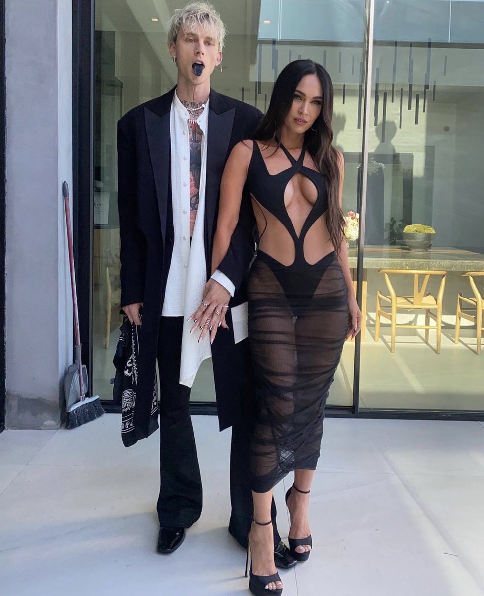 Megan Fox and <a href="/machinegunkelly/">blonde don</a> really said:

kissed                        touched by the
by an angel               devil