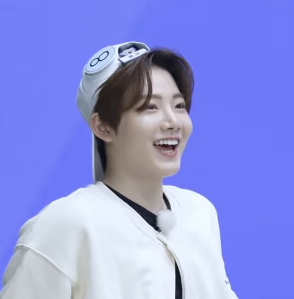 he looks so cute in that hat