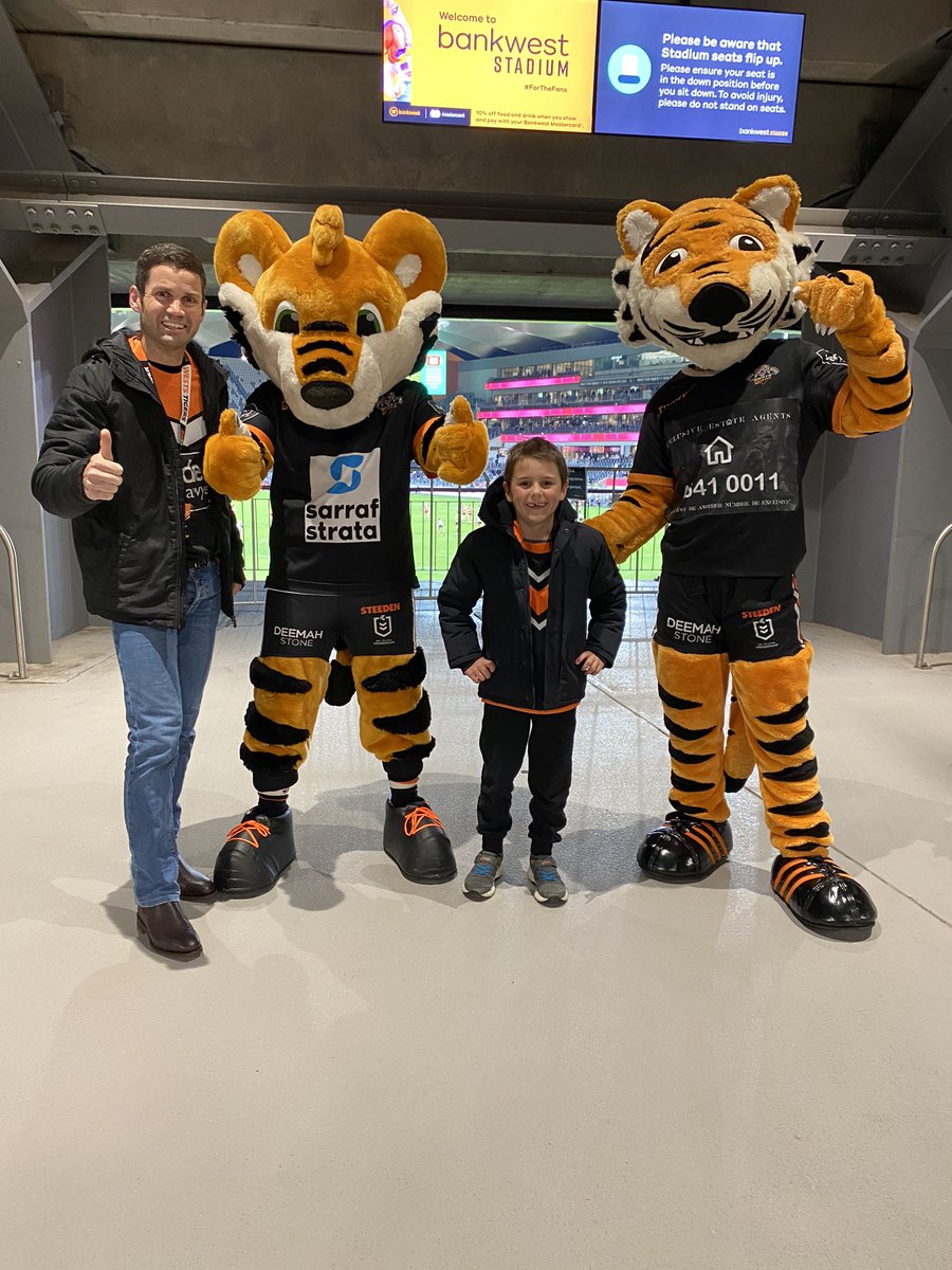 #showyourstripes first Friday night at the footy with Tigers No 1 fan Angus