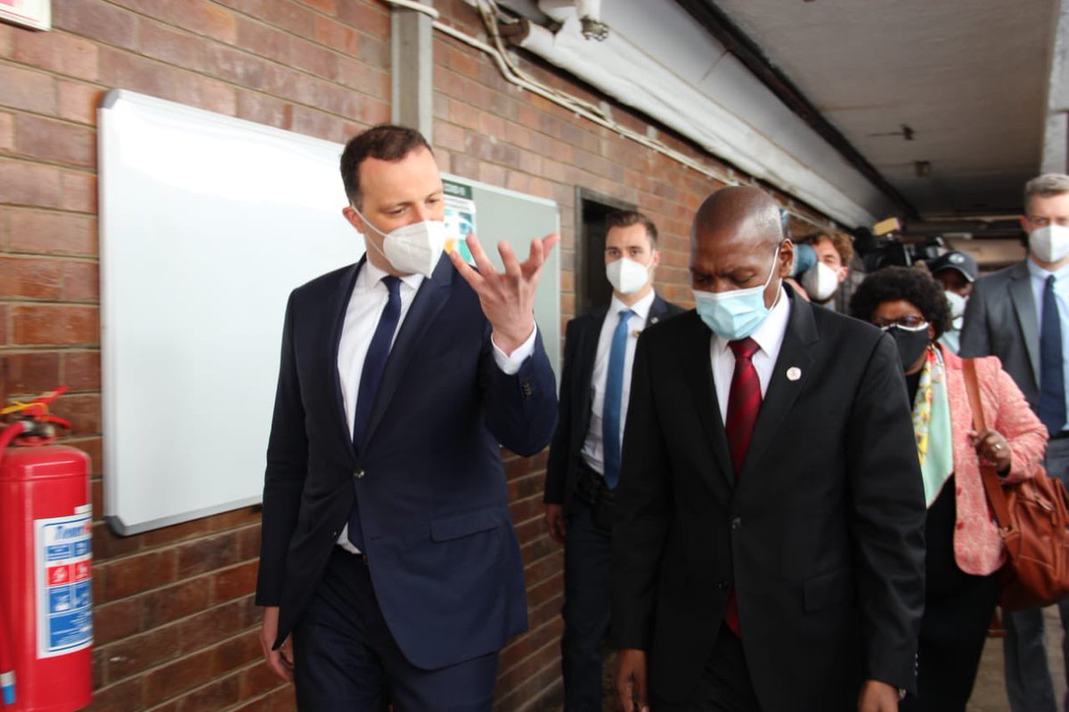 Minister Dr Zweli Mkhize and the Minister of Health in Germany walk about the facility at the NHLS to see the machines donated by the German government.