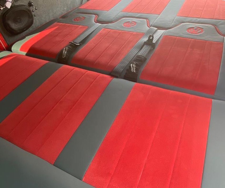 VisionLeisure's tweet photo. Another busy week here at Vision! Here we have a leatherette and red nappa fabric full width R&amp;R bed with jigsaw headrests with VW logos. #campervanupholstery #motorhomeupholstery #vwupholstery #vwcampervanupholstery #motorhomeupholsterers #vwupholsterers #autotrim #autotrimmer https://t.co/nntGYp82EQ