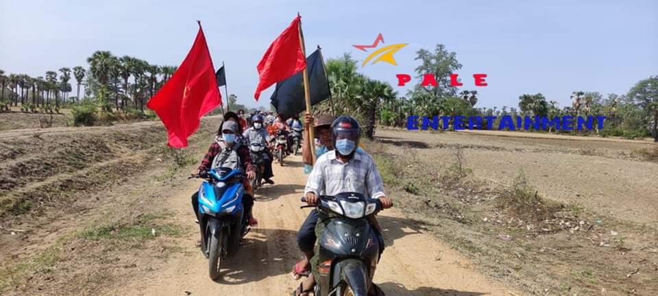 EiLaiYeeKo1's tweet photo. A group of motorcyclists marched in the southern part of Pale township today. They chanted revolutionary slogans along the protest to oppose the terrorist regime in the scorching sun. #WhatsHappeningInMyanmar #May28Coup #MilkTeaAlliance https://t.co/wzufQIMgtN
