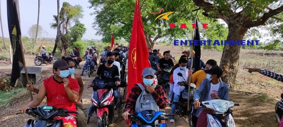 EiLaiYeeKo1's tweet photo. A group of motorcyclists marched in the southern part of Pale township today. They chanted revolutionary slogans along the protest to oppose the terrorist regime in the scorching sun. #WhatsHappeningInMyanmar #May28Coup #MilkTeaAlliance https://t.co/wzufQIMgtN