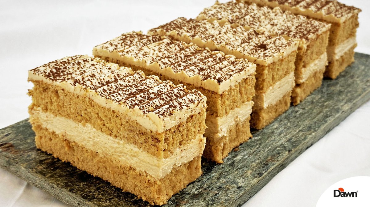 DawnFoodsUK's tweet photo. This Cappuccino Slice is a double coffee hit, using our NEW Cappuccino Fudge Icing on the top, and Coffee Frosting in the centre. ☕🍰
It’s sure to keep your customers going through the day!
Recipe here: #fudgeicing #cappuccino
https://t.co/9CcFlJuzLh https://t.co/5uaUepeNYm