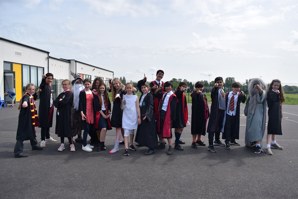 SRA_StAlbans's tweet photo. Well, what a lovely way to end Book Week at SRA. The sun is out and the primary playground is buzzing with lots of lovely characters.   #srabookweek #sunshine #happyhalfterm https://t.co/5Az7Joky2D
