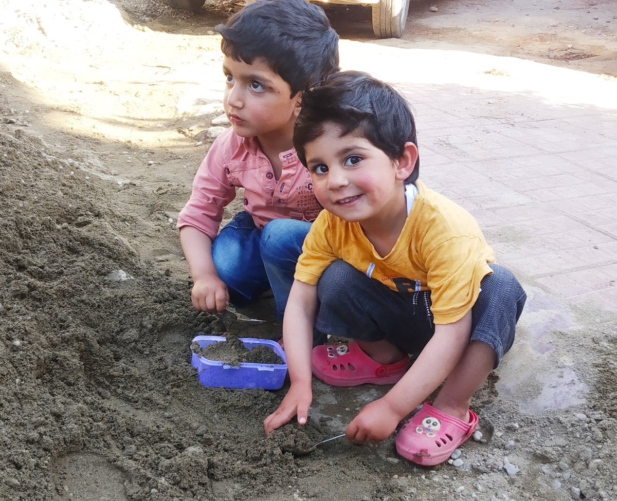 Children playing with sand