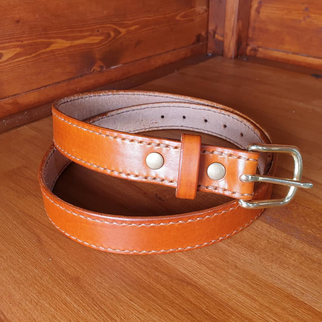 Just finished making my first belt and it turned out great! This is a veg tan strip, dyed, stitched and polished up with a wax with a gorgeous solid brass buckle.
These will be available in my British Craft House store soon!#leather #belt #tbch
