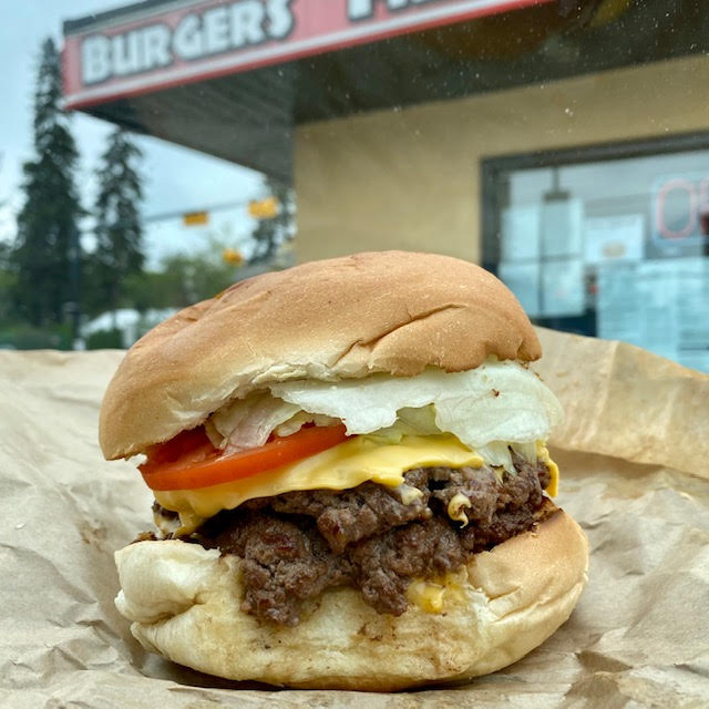 CBCEyeopener's tweet photo. What's your favourite #yyc burger? Elizabeth Carson went on the hunt for the city's best take-out burger. This was her winner. Recognize it? Tune in now to hear her list. https://t.co/oqJL8yeppm