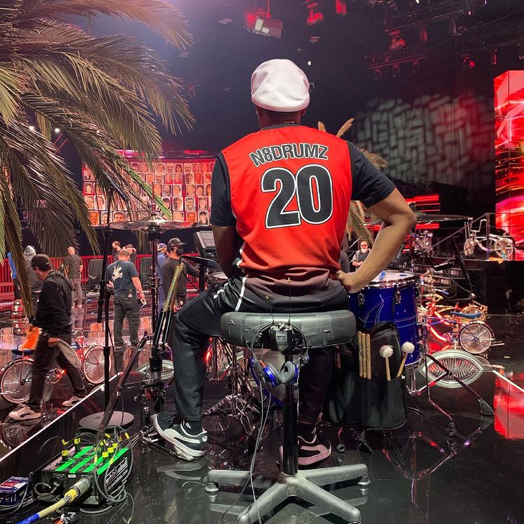 FloodedStudios's tweet photo. Did you see @FloodedStudios on @NBCTheVoice this week? We worked with the show’s house band drummer, @n8drumz, on a custom jersey to commemorate the 20th season. #FLDD #FloodedStudios #DesignSomethingDifferent #FriendsOfFlooded #CustomApparel #GraphicDesign #TheVoice https://t.co/WoSGwQh0xh