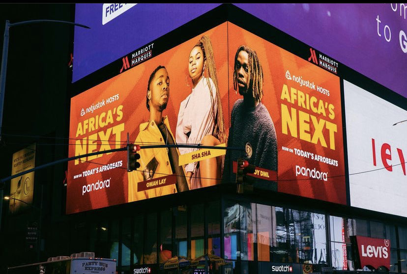 Billboard ad in the streets of New York celebrating #AfricaDay2021 & Africa’s next for @pandoramusic hosted by Notjustok! 
Featuring: @Omah_Lay , @fireboydml & @ShaShaOfficial_