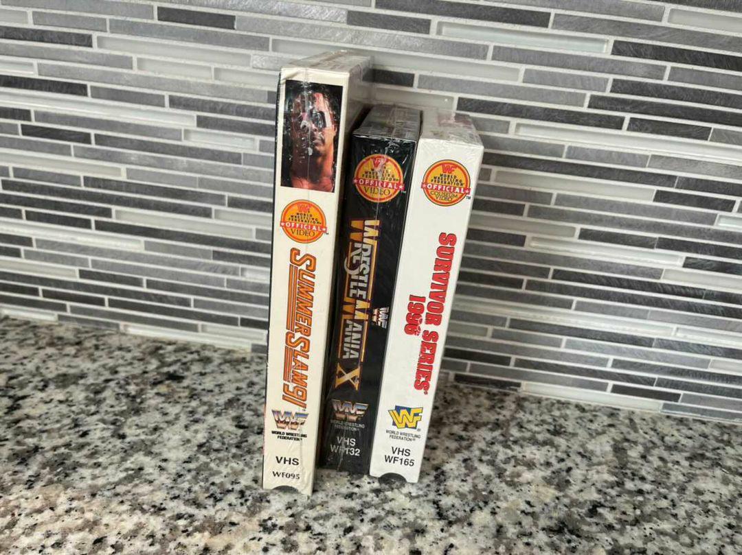 MajorWFPod's tweet photo. New additions to @TheMattCardona's ever-growing Coliseum Video VHS collection!
SummerSlam '91, WrestleMania X, and Surivor Series 1996!
#ScratchThatFigureItch https://t.co/wTzpvmonuL