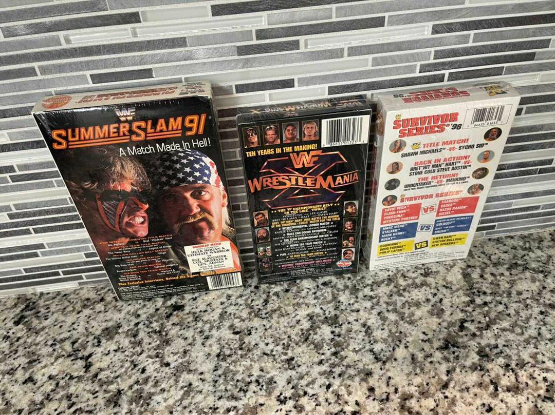 MajorWFPod's tweet photo. New additions to @TheMattCardona's ever-growing Coliseum Video VHS collection!
SummerSlam '91, WrestleMania X, and Surivor Series 1996!
#ScratchThatFigureItch https://t.co/wTzpvmonuL