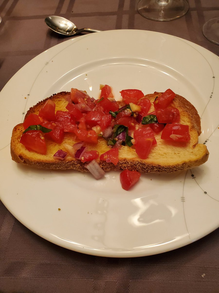 SethJMeyer's tweet photo. A pesto & goat cheese stuffed challah (and a plain one), bruschetta, salmon, and olive oil ice cream. Shabbat shalom #pacooks https://t.co/jiOjqRlEnA