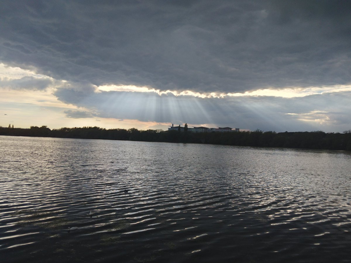 Broken_punk1005's tweet photo. A few laps round the res this evening. The sun's rays shine through the looming storm cloud which drifted overhead without depositing any of the wet stuff #neededthatrun #timetomyself @UKRunChat @RunThroughUK https://t.co/lozXjtDRsz