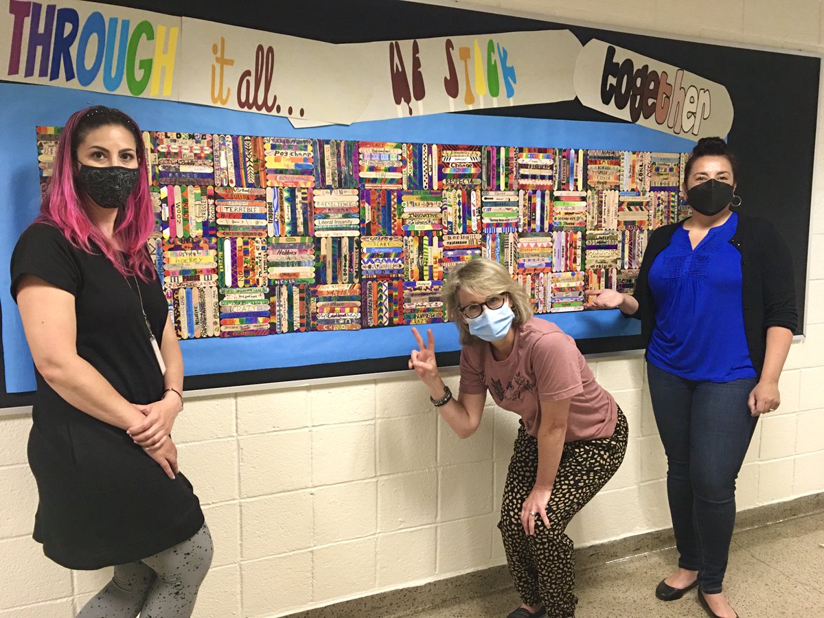 ALMSNewRo's tweet photo. We thank our ALMS Art Teachers, Ms. DelGuercio, Ms. Dellaripa, and Ms. Suplina, for their beautiful collaboration highlighting students summing up their experiences through the pandemic on a craft stick. “Through it All, We Stick Together” is our newest bulletin board display. https://t.co/aG25IwFqDf