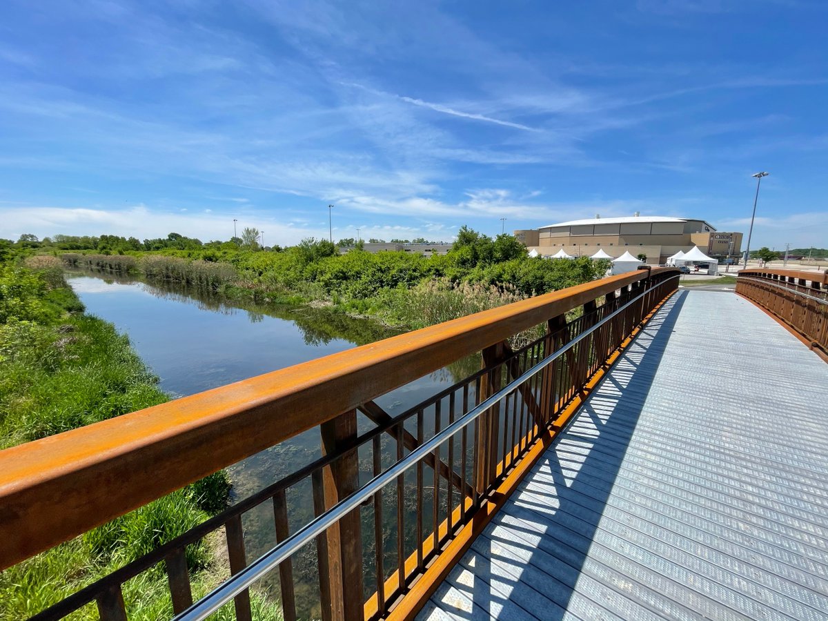 drewdilkens's tweet photo. The new 30-metre McHugh Bridge has been completed! This new iron bridge helps connect two popular trails: Little River Corridor &amp; Ganatchio Trail. Find it located right across Little River near the WFCU Centre and McHugh Street. #BuildBackBetter #ExploreYQG https://t.co/lKKk01IlsK
