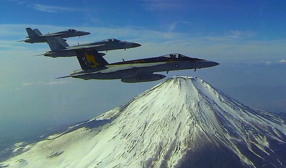 US Navy FA18E Super Hornets VFA115 in flight over Mount Fuji, Japan. Perhaps keeping a good eye out for Godzilla.