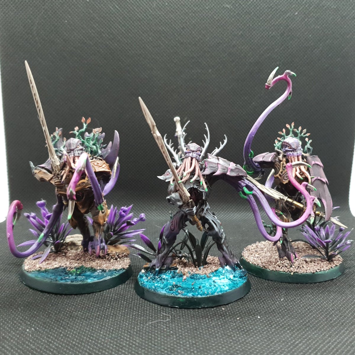 Heed_Paints's tweet photo. Group shot of completed Venomthropic Hunters
Sylvanids are coming🌳🪳
#WarhammerCommunity #warmongers #kitbash #purplepink #conversion #sylvaneth #tyranid #sylvanid #tyraneth #venomthrope #kurnothhunter #warhammer40k #warhammeraos https://t.co/OTpfTJ5Bam