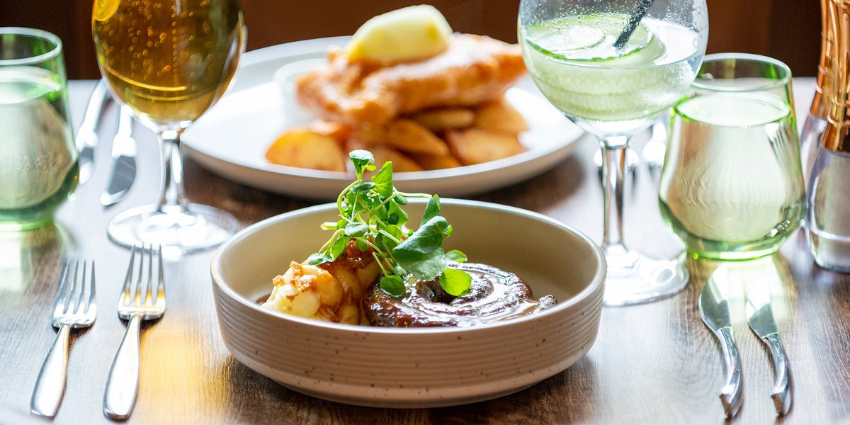 Hungry? 😋 Why not treat yourself to our in-house smoked sausage and cheddar mash, served with seasonal greens, crispy onions, and stout gravy? It's oh-so-delicious! 🤤

Call us on 01635 38000 to reserve a table today.