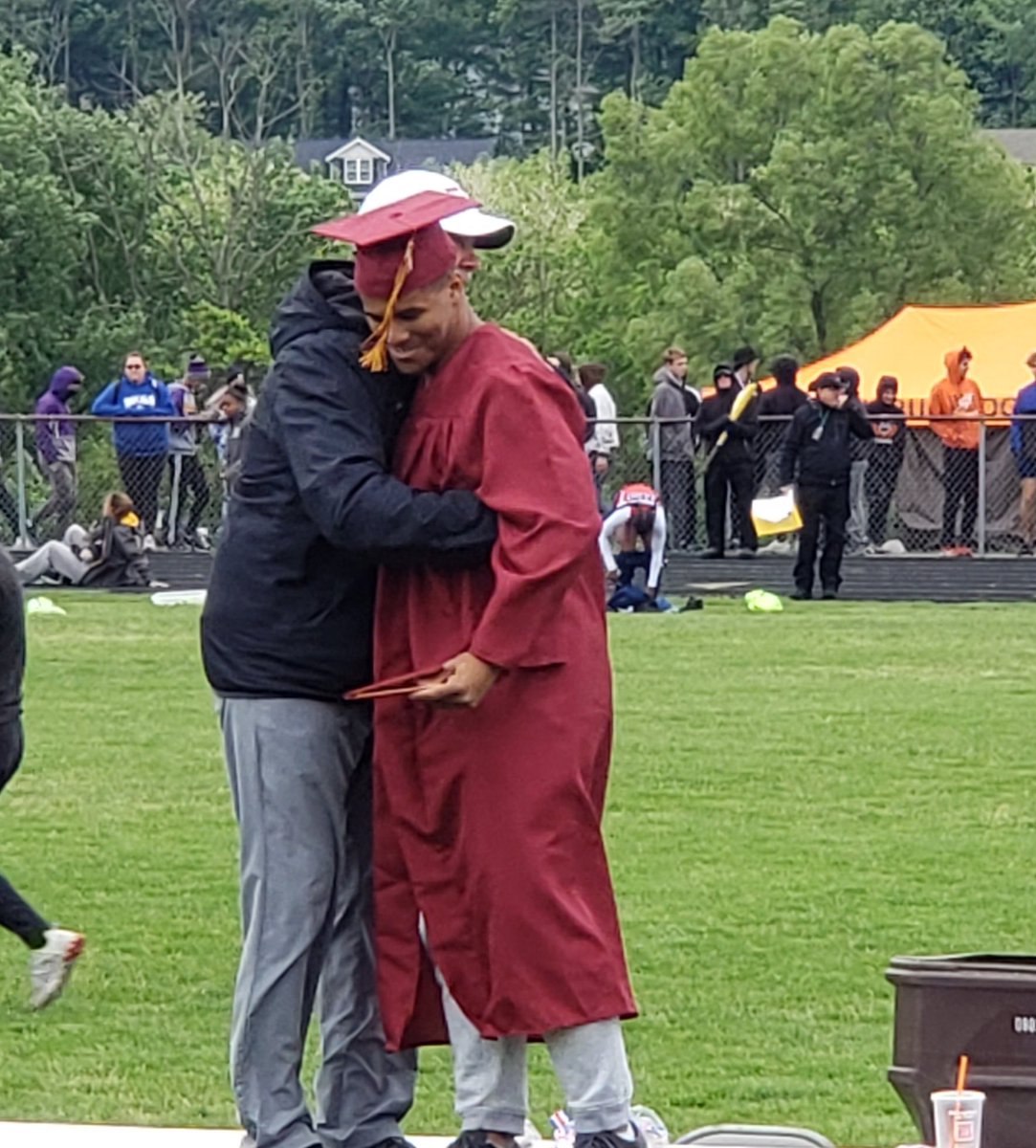 Bigmikenick1's tweet photo. Words cannot express the gratitude we have for @BishopWatterson.  Today, Cam was unble to attend his graduation due to his regional track meet. Watterson somehow worked with the AD at @LexAthleticDept  and he received his diploma in front of the whole stadium of cheering people! https://t.co/JDCubChz4r