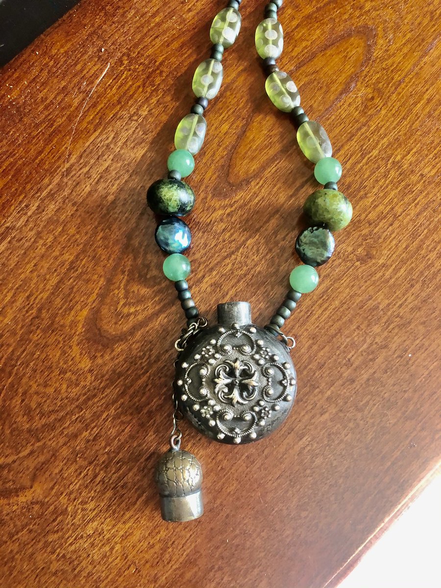 BonesStones1's tweet photo. While scouting, I came across this antique little bottle. I couldn’t quite figure out what I wanted to do with it. So I repurposed it into a gorgeous medieval looking potion necklace. What say you? https://t.co/9HreIMcetA