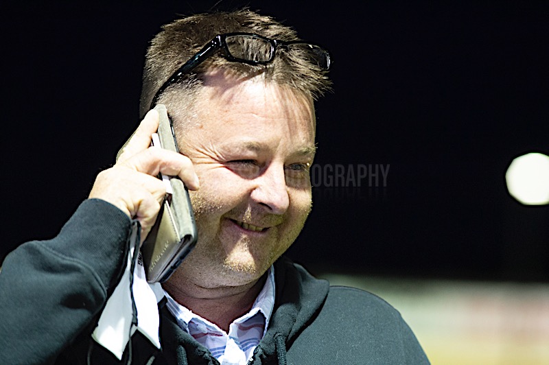 SteveNashPhotos's tweet photo. That Cat 1 feeling: trainer Jim Daly takes a call immediately following aptly named Blue Tick George's George Ing St Leger victory @yarmouthstadium @DavidJMitch @JimDaly5 https://t.co/QYAPzqJHc2