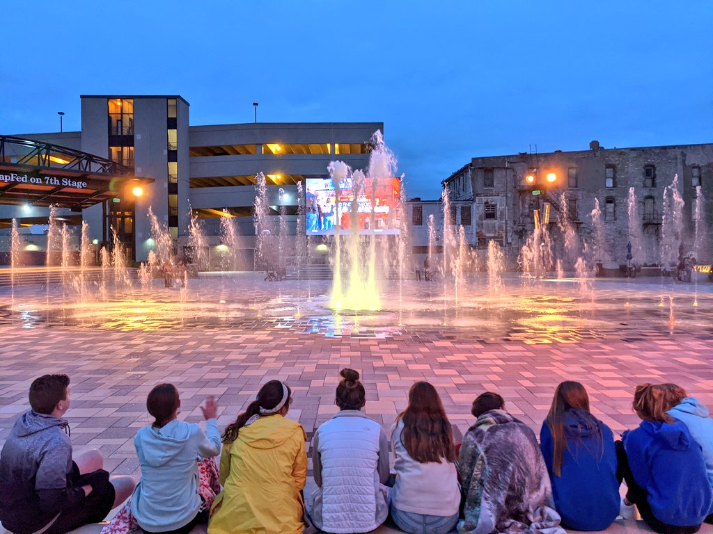 These awesome kids braved the cold wind last night to enjoy our fountain show at @evergyplaza. #VisitTopeka