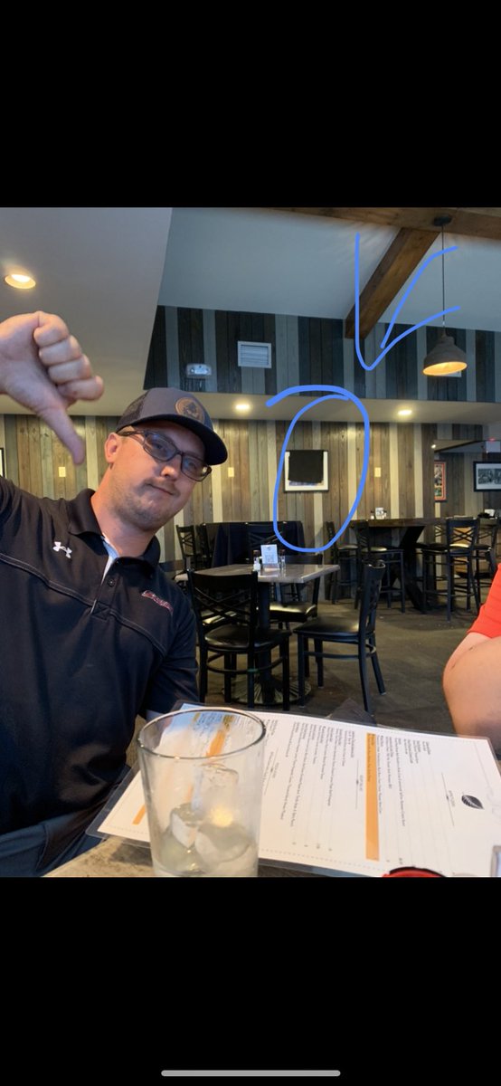 VilleEvans's tweet photo. When you’re in NC and you see an autographed picture of @laettnerbball hitting “The Shot” you have to cover it up. @KySportsRadio @Ted_E27 https://t.co/YWxOUkeroP