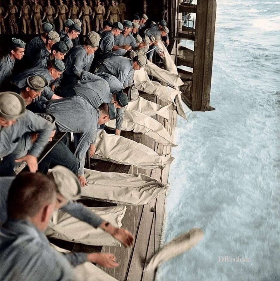 NEVER FORGET

'This is a mass burial at sea, on the USS Intrepid in 1944 following a kamikaze attack. I've never seen this photo, and I figure most of you probably haven't either. I posted so people can see, and remember the incredible sacrifices made on our behalf.'