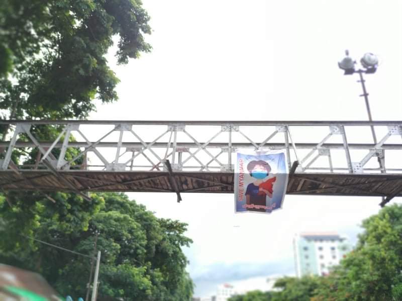 LeeDam_3's tweet photo. In some public areas of #Yangon, Gen Zs hung banners that was written anti-slavery education text. 

#May30Coup
#WhatsHappeningInMyanmar https://t.co/1Tsxj2eX2y