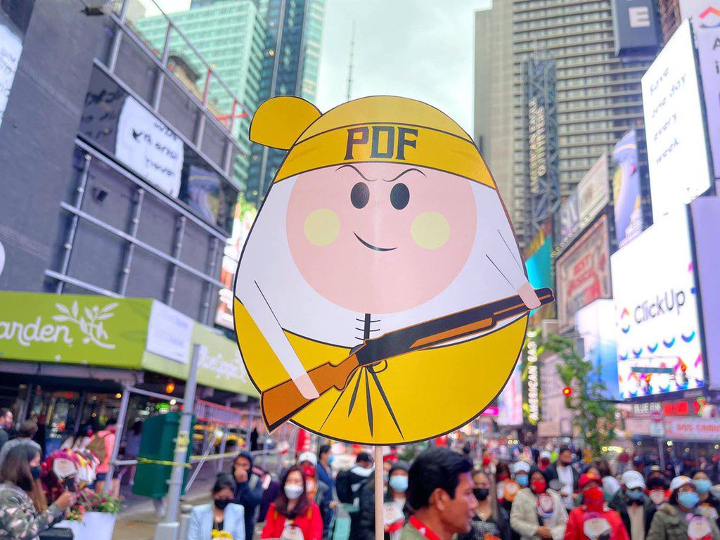 BunnyPhyoe's tweet photo. Myanmar Nationalities in United States staged a protest against Genocidal Myanmar Junta at Time Square, NYC and to raise recognition of our legitimate government NUG. @NUGMyanmar @IntlCrimCourt @CIJ_ICJ @UN #May30Coup #WhatsHappeningInMyanmar https://t.co/835DZuQNxa
