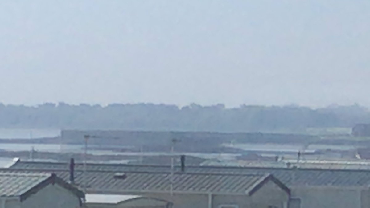 Suecr76's tweet photo. Hazy sunshine over Ballywalter harbour from the caravan window #goodday #myfavouriteplace https://t.co/Y3LnzpqT43
