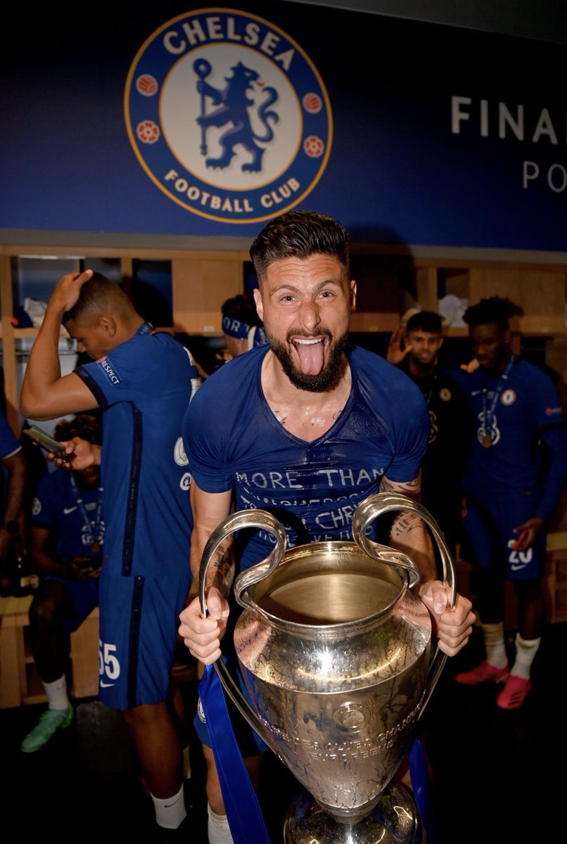 Giroud with Champion League trophy