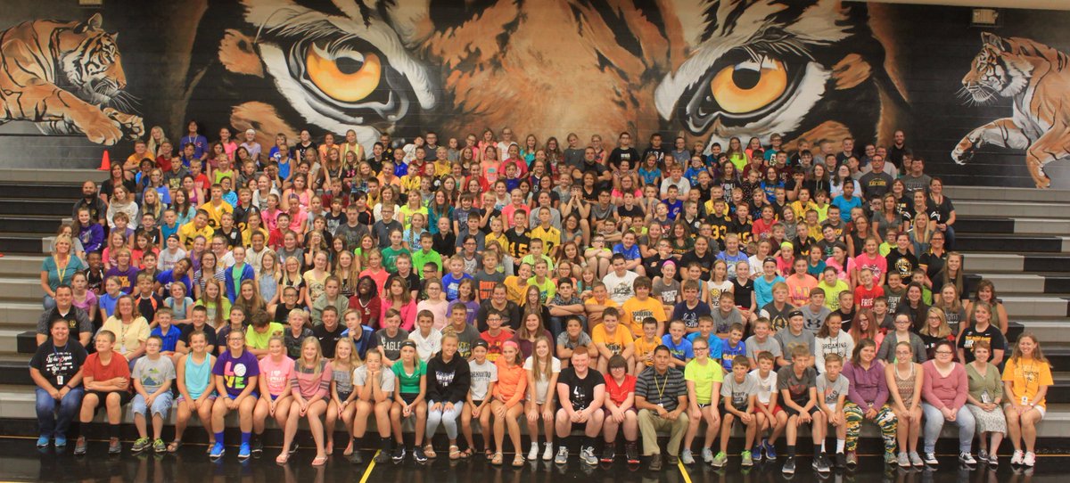 TiptonTigersMS's tweet photo. On their 1st day of MS (top few rows) they got a Tiger tunnel. Thursday they made their final walk in our halls & across the Tiger logo for the last time. They've been a great class and will do awesome at THS. Congrats!!! #TMSTigerPride π― https://t.co/giEHaMDjct