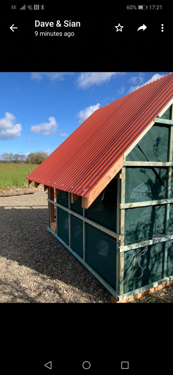 Roof’s on! A splash of agricultural red against a bright blue sky. 
#pods #gardenoffice #gardenroom #homeoffice #handmade #madeinwales #welshlarch #welshtimber #sustainable #follie  #holidaycabin #crinklytin #workingfromhome #homeworking #glampingpod #gardenstudio #glampingpod