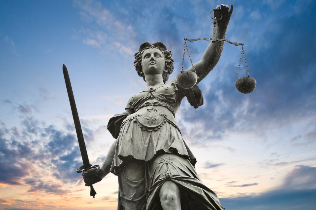 Picture: statue of Lady Justice, with balanced scales in her left hand and an upturned sword in her right hand