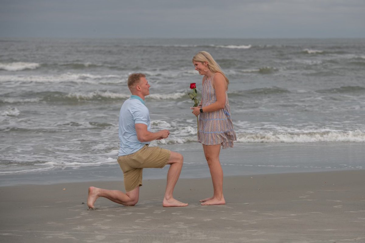 DarylChandler's tweet image. Dolphins, dinner, engagement, and porch lights all in one day. Vacation is off to a great start in OIB!