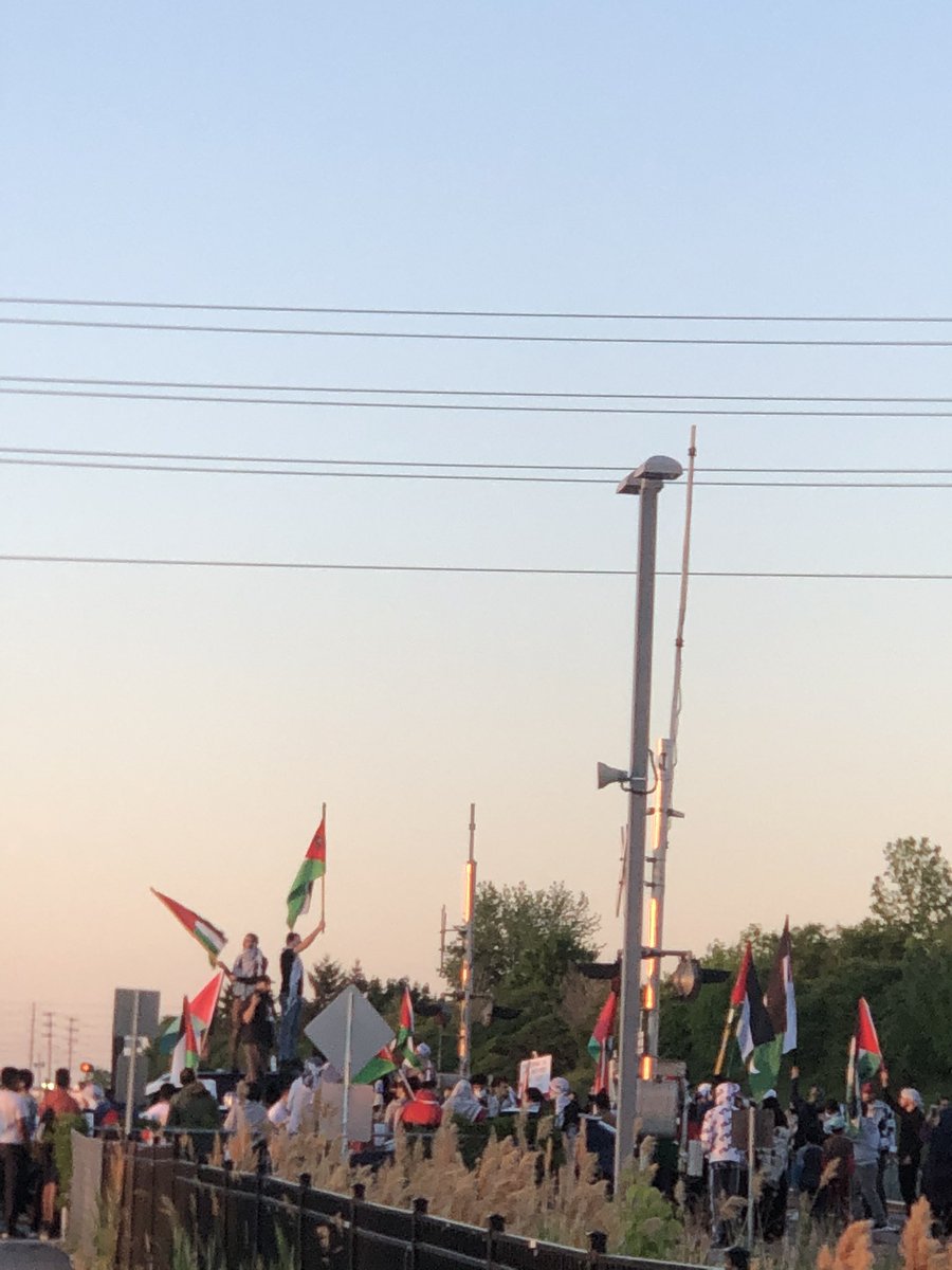 HumHum83's tweet photo. The Palestinian protesters have occupied the railway in Mississauga. They’re demanding an arms embargo on Israel. Spread the word. https://t.co/v9ejYClYso