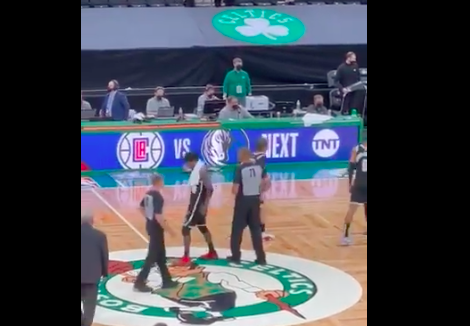 kyrie stomps on logo