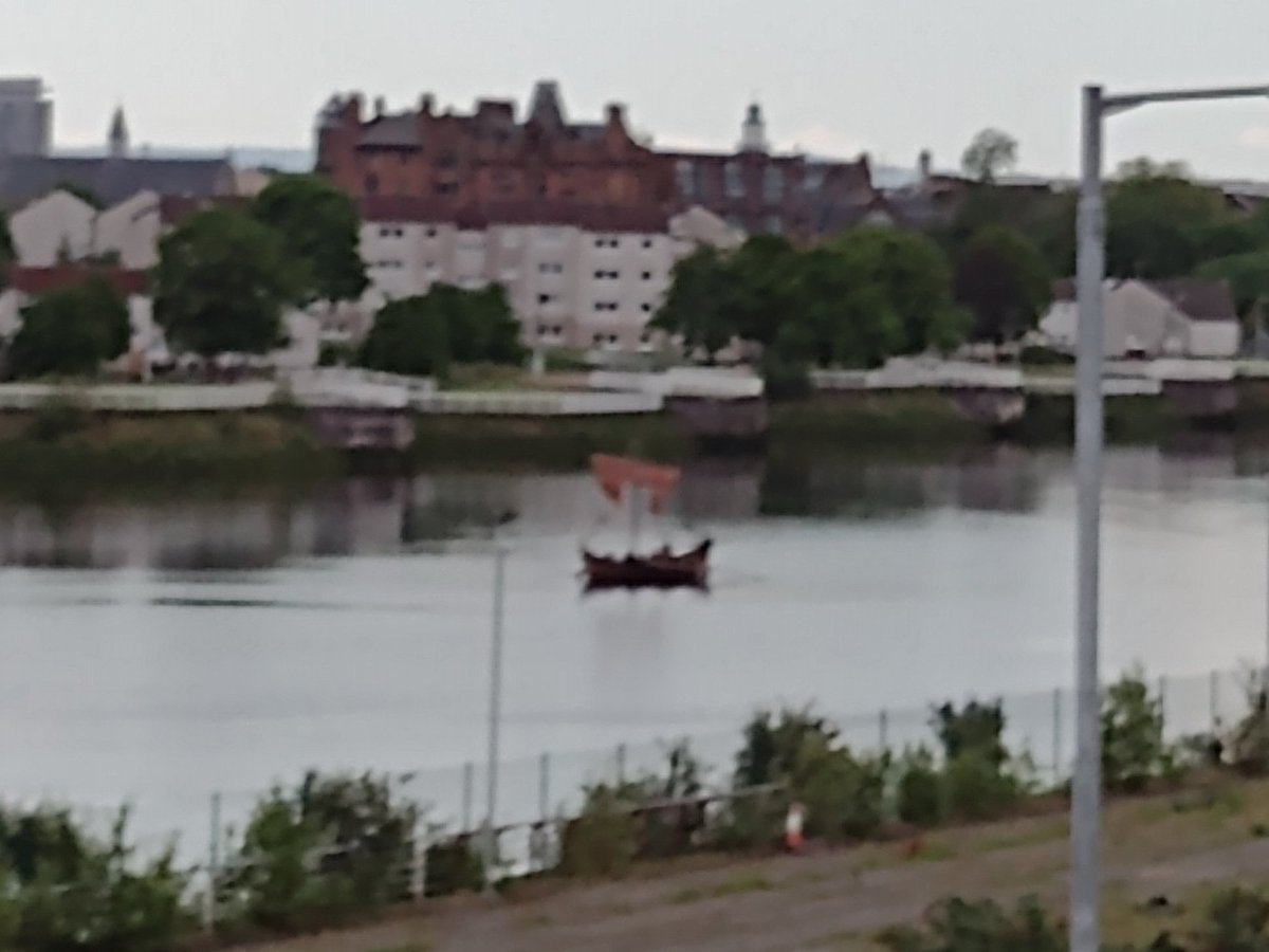 Spotted on the Clyde yesterday, some people paddling along in what looked like a Viking longship. Something to do with @GovanStones?