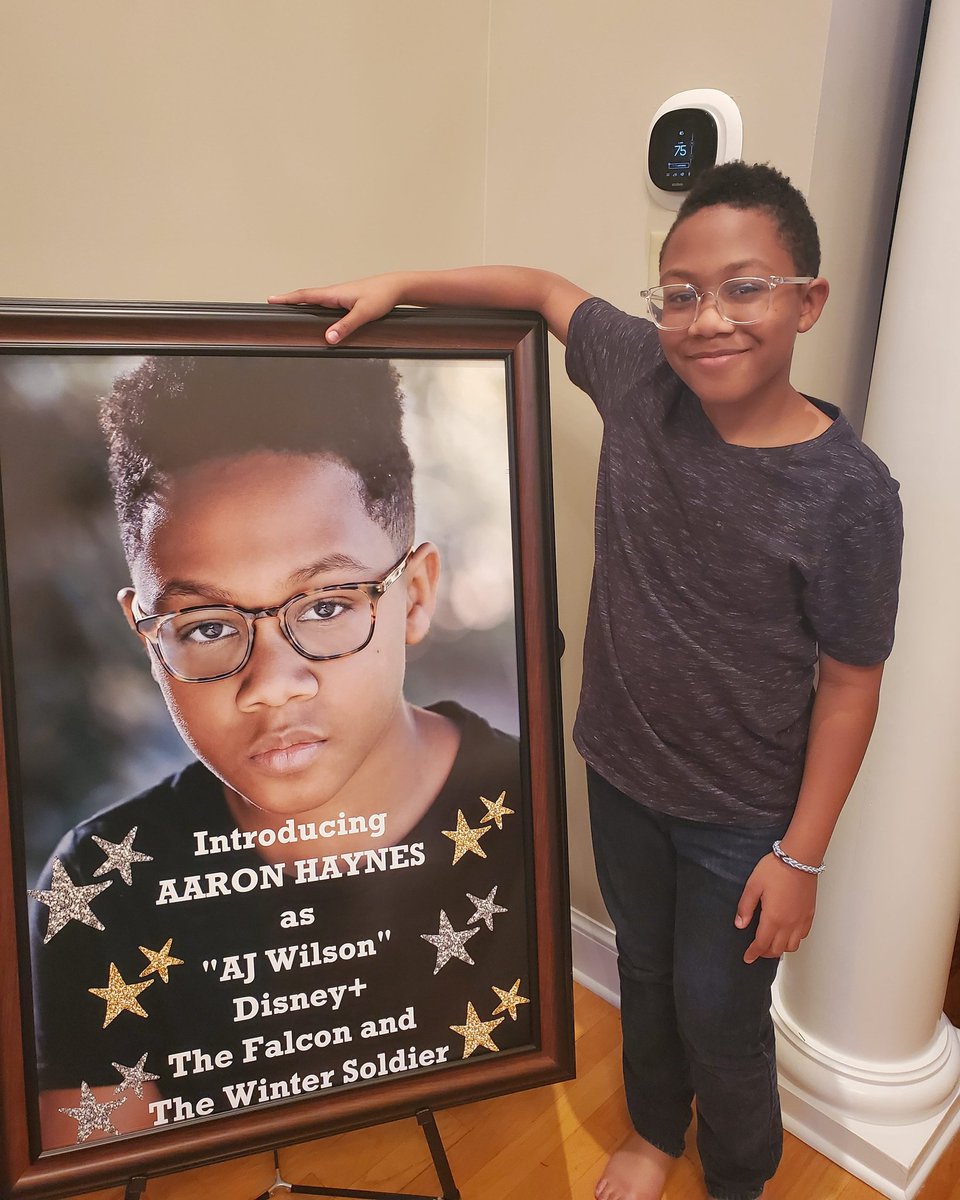 RealAaronHaynes's tweet photo. My grandparents framed this ridiculously large poster from the premier party my mom threw https://t.co/QnYbNU941x