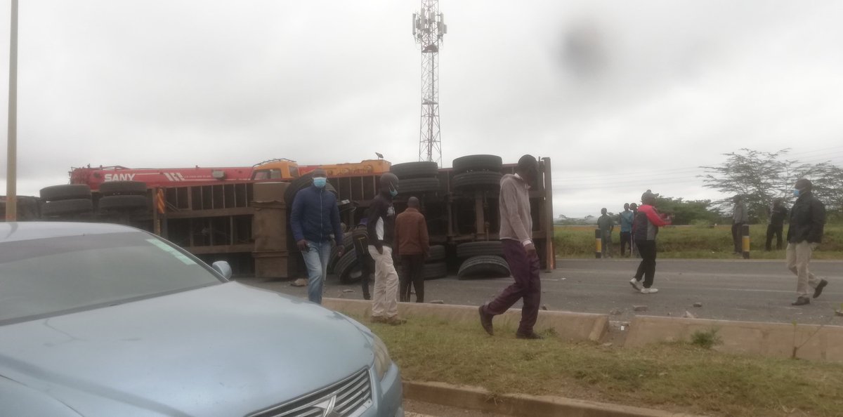 Container trailer overturned across the road on the Southern bypass next to carnivore resurant, avoid the Rd by any means necessary.