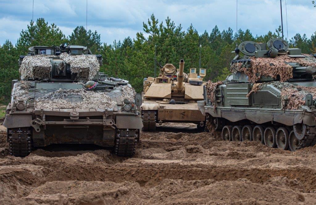 SpainNATO's tweet photo. The 🇪🇸 @EjercitoTierra contingent deployed in @eFPBGLatvia 🇱🇻 participated in #SummerShield together with our @NATO Ally 🇺🇸 @USNATO.
The 🇱🇻-led annual multinational exercise tests combat support elements, including artillery, air defence & reconnaissance.
#WeAreNATO
📸@EMADmde https://t.co/Npf3aHEUqa