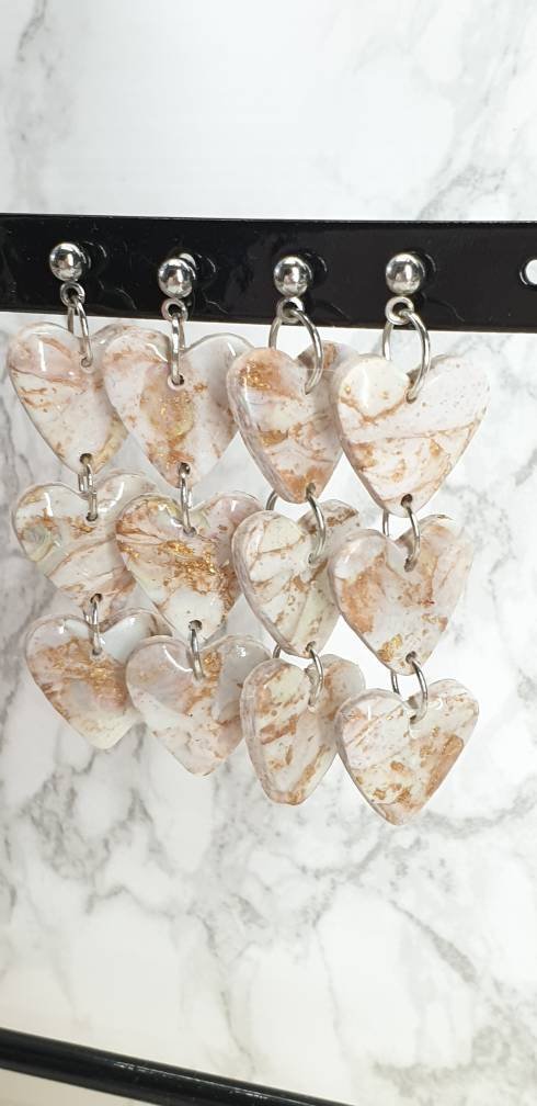 vickipoem's tweet photo. Excited to share the latest addition to my #etsy shop: Handmade marble polymer clay heart dangle earring. Silver ball stud findings https://t.co/RGSJzbgSRp https://t.co/xjHYFLIi9Z