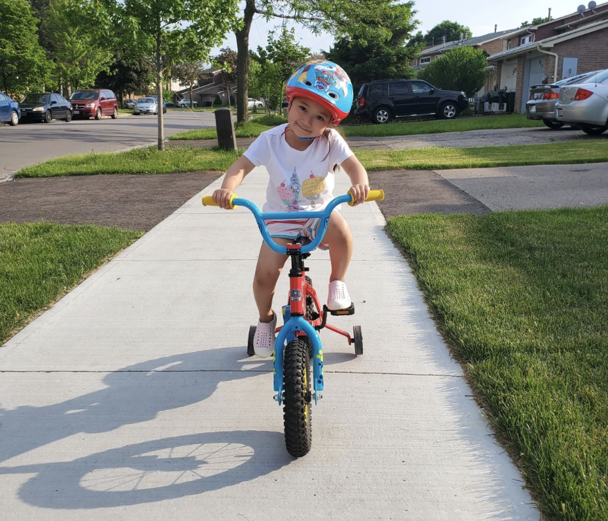 If your child rides a bike, scooter or skateboard, remember to always make sure they are wearing a helmet and wearing it properly. #PlaySafeOutdoors #SKW2021 parachute.ca/safekidsweek