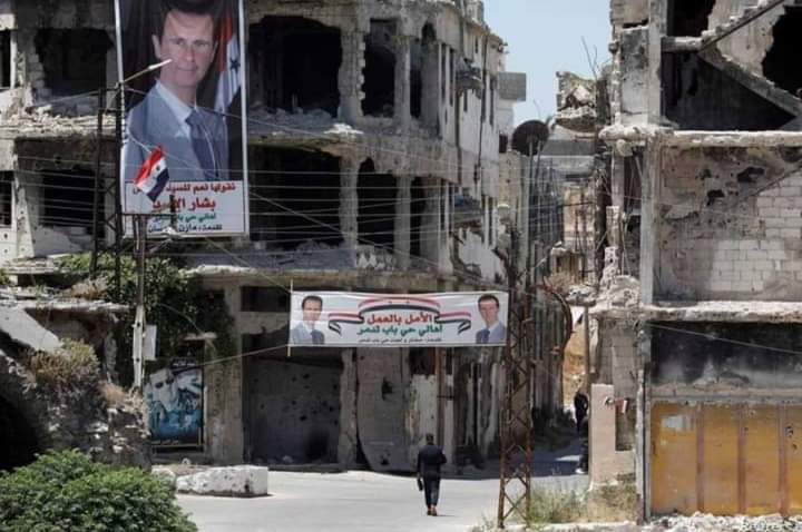 Levantinian__'s tweet photo. #FireAssadOutOfWHO #SyriaBleeds
A picture speaks 1000 words.
Banners celebrate Assad's "victory" in Syria. The nation he destroyed and sold to Russia and Iran shows the reality.
#Syria https://t.co/stc7q2jrEp