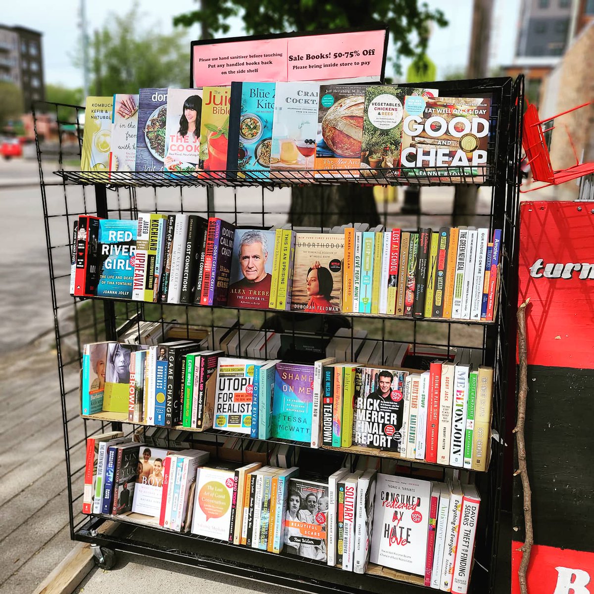 Feeling summery with the first day of sidewalk browsing! These #bargainbooks are at least 50% off. Browse online too! turning.ca/?q=h.tviewer&f… #shoplocalyxe #SummerVibes #broadwayyxe