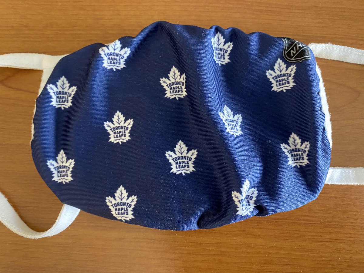 newf93's tweet photo. @MapleLeafs @douggilmour On my way to NL from the U.S. Wore this mask on my flight to and during hotel check in for my mandatory 3 day quarantine in Montreal because I will still love this team, win or lose. But I sure hope itโs a win! #WeAllWearTheC #WinitforJT #LeafsForever https://t.co/d6S70HsfkV